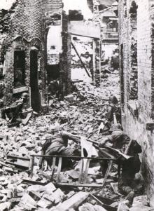 Japanese naval infantry of the Shanghai Special Landing Force fighting in streets near Sanyili, Chapei near Shanghai.